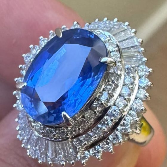 Unheated Ceylon sapphire ring with double diamond halo, GIA certified