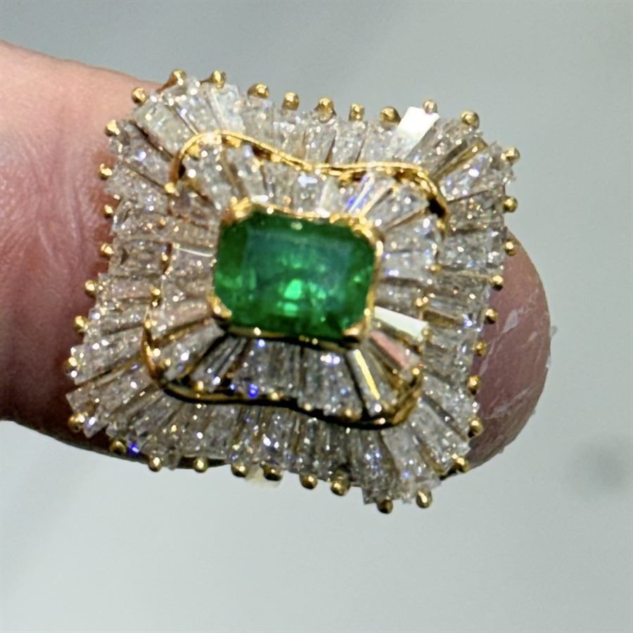 Emerald-cut emerald and diamond ballerina cocktail ring in yellow gold