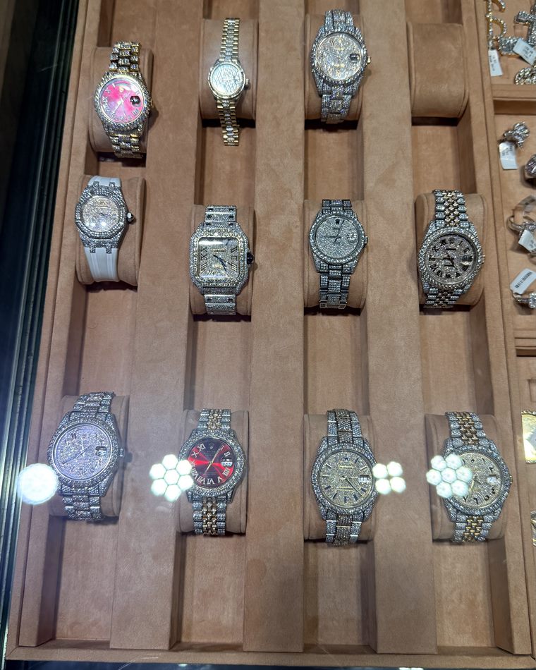 Tray of diamond-set watches in the Bizak & Co. Miami case