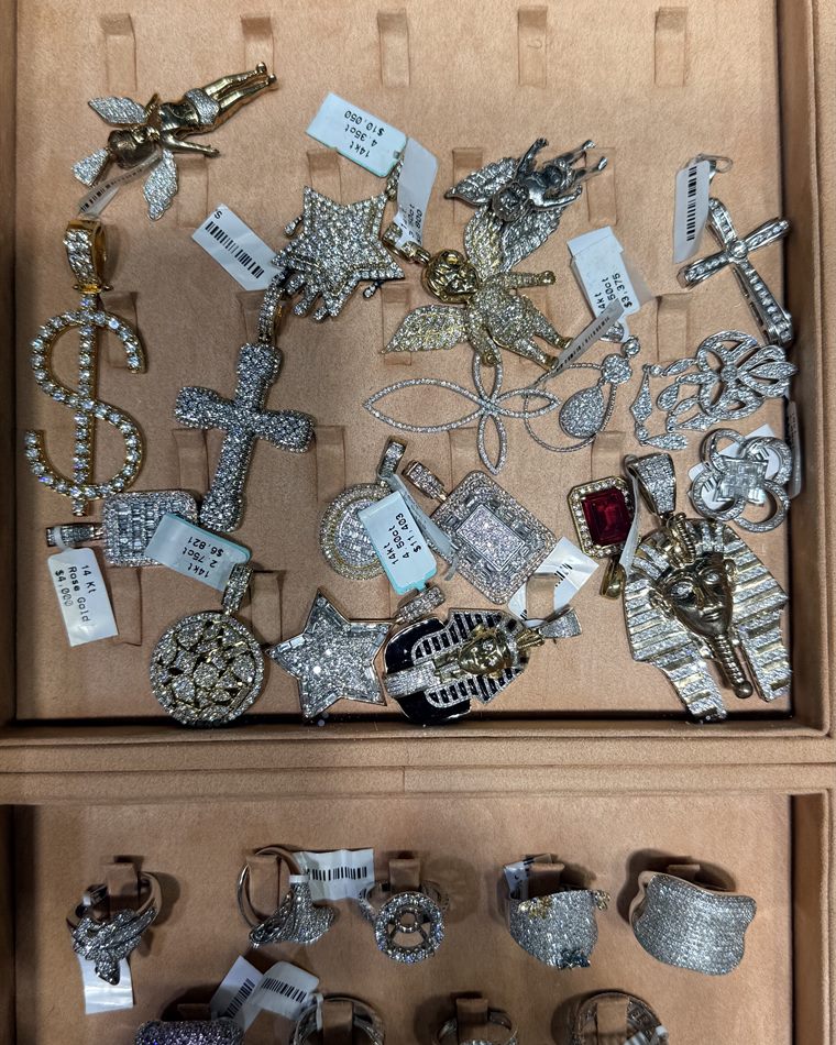 Diamond charm pendants in the Bizak & Co. case