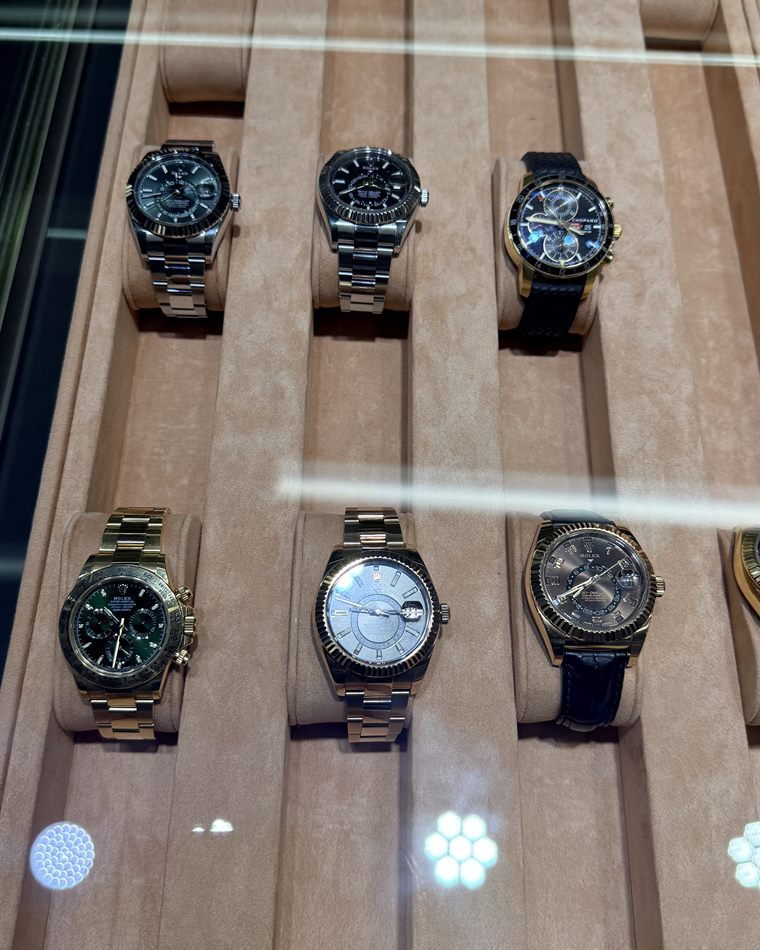 Two-tone Rolex Datejust and Daytona watches in the Miami counter